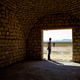 A member of Karm Solar looking out at the farm